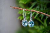 Boucles d'oreilles topaze bleue ovale (grand)