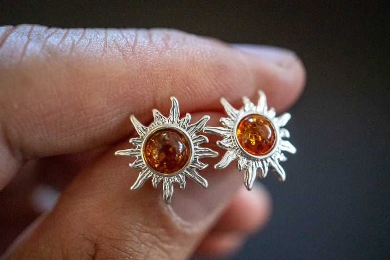 Boucles d'oreilles en ambre cognac en forme de soleil