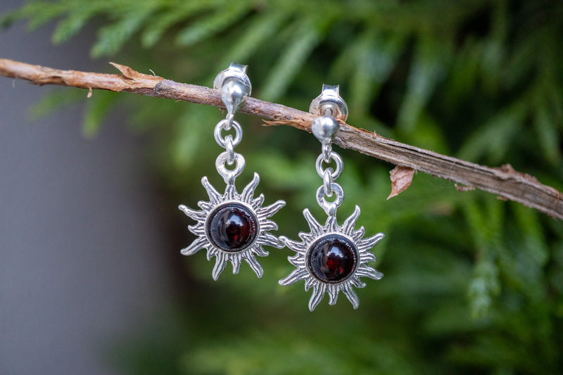 Boucles d'oreilles en ambre cerise en forme de soleil