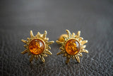 Boucles d'oreilles en ambre cognac en forme de soleil (vermeil)