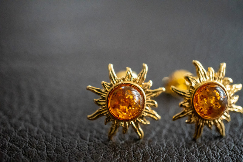 Boucles d'oreilles en ambre cognac en forme de soleil (vermeil)