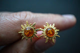 Boucles d'oreilles en ambre cognac en forme de soleil (vermeil)