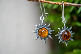 Boucles d'oreilles en ambre cognac en forme de soleil