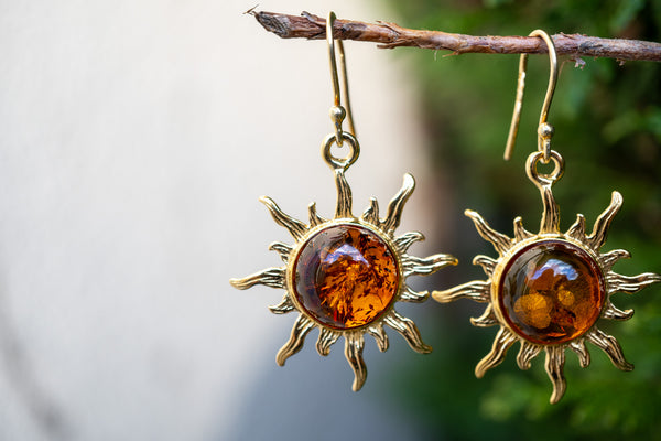 Boucles d'oreilles en ambre cognac en forme de soleil (Vermeil)