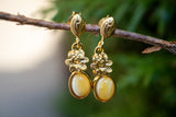 Boucles d'oreilles avec ambre blanc