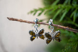 Boucles d'oreilles en ambre vert en forme de papillon