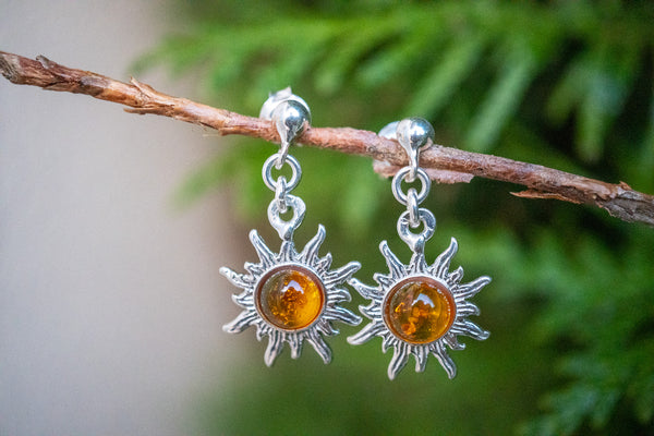 Boucles d'oreilles en ambre cognac en forme de soleil