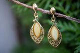 Boucles d'oreilles avec ambre blanc