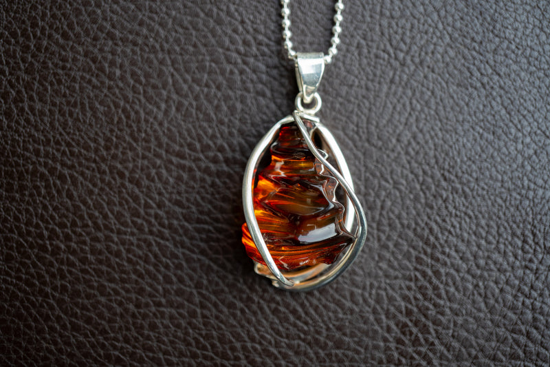 Cognac Amber Honeycomb Pendant – Natural Elegance