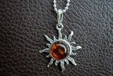 925 silver sun pendant with cognac amber from the Baltic Sea