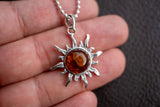 925 silver sun pendant with cognac amber from the Baltic Sea