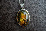 Oval Pendant in 925 Silver with Green Baltic Amber