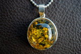 925 silver pendant with green amber from the Baltic Sea