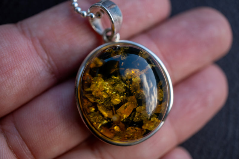 925 silver pendant with green amber from the Baltic Sea