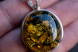 925 silver pendant with green amber from the Baltic Sea