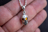 925 silver skull pendant with cognac amber from the Baltic Sea