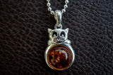 925 silver cat pendant with cognac amber from the Baltic Sea