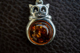 925 silver cat pendant with cognac amber from the Baltic Sea