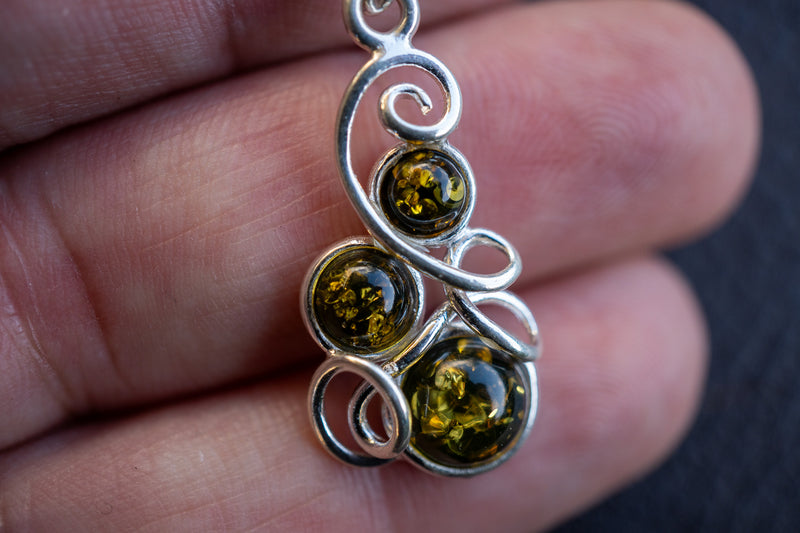 925 silver pendant with green amber from the Baltic Sea