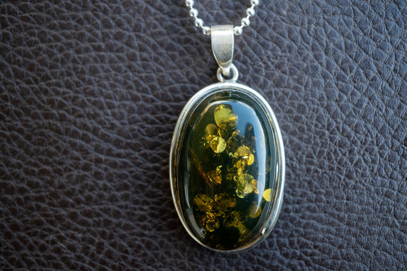 Oval Pendant in 925 Silver with Green Baltic Amber