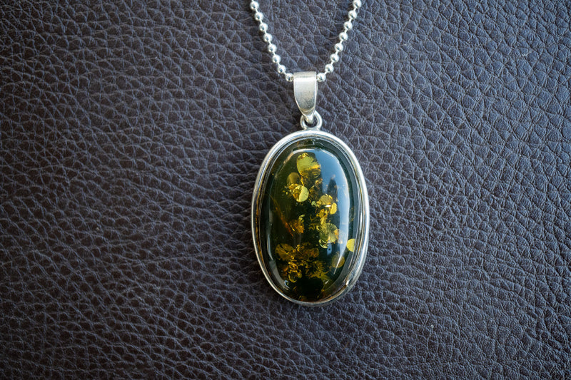 Oval Pendant in 925 Silver with Green Baltic Amber