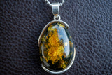 Oval Pendant in 925 Silver with Green Baltic Amber