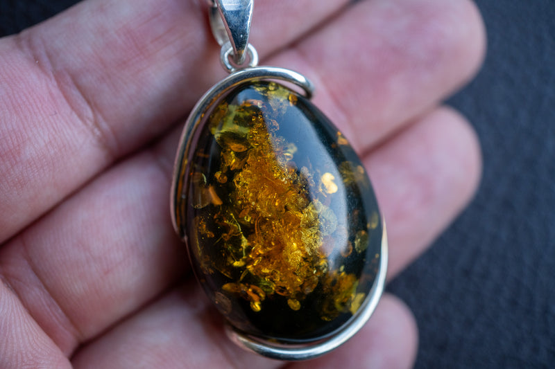 Oval Pendant in 925 Silver with Green Baltic Amber